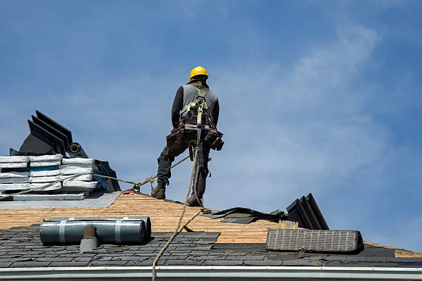 Professional Roof Replacement technician working in Huntsville, MO